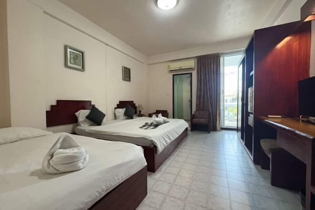 Select Comfort beds, minibar, desk, laptop workspace