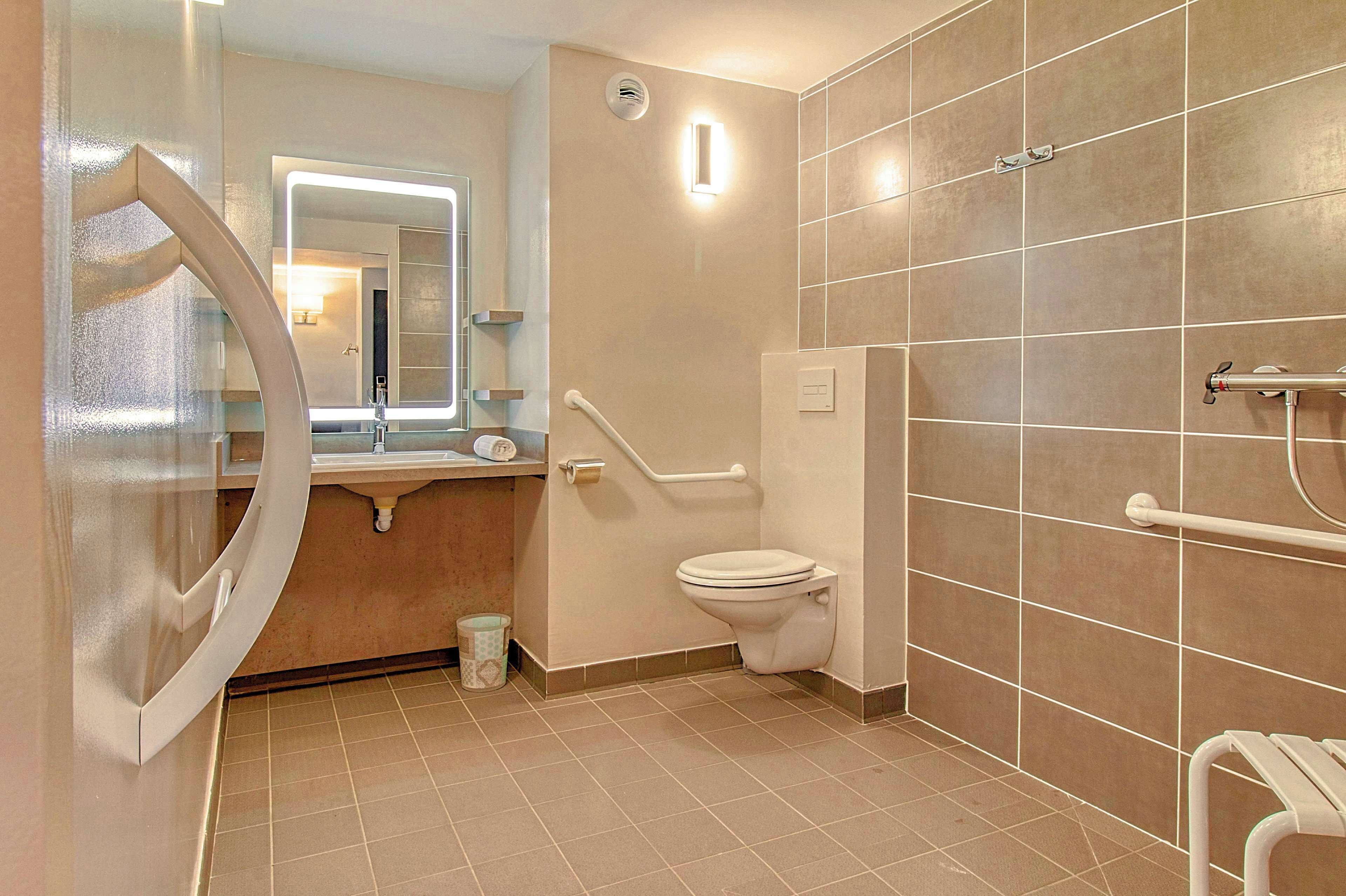 quadruple room | bathroom | shower, rainfall showerhead, eco-friendly toiletries, hair dryer