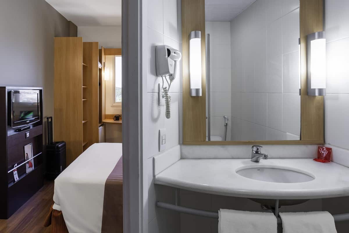 Apartment, 2 Twin Beds | Minibar, desk, blackout drapes, soundproofing