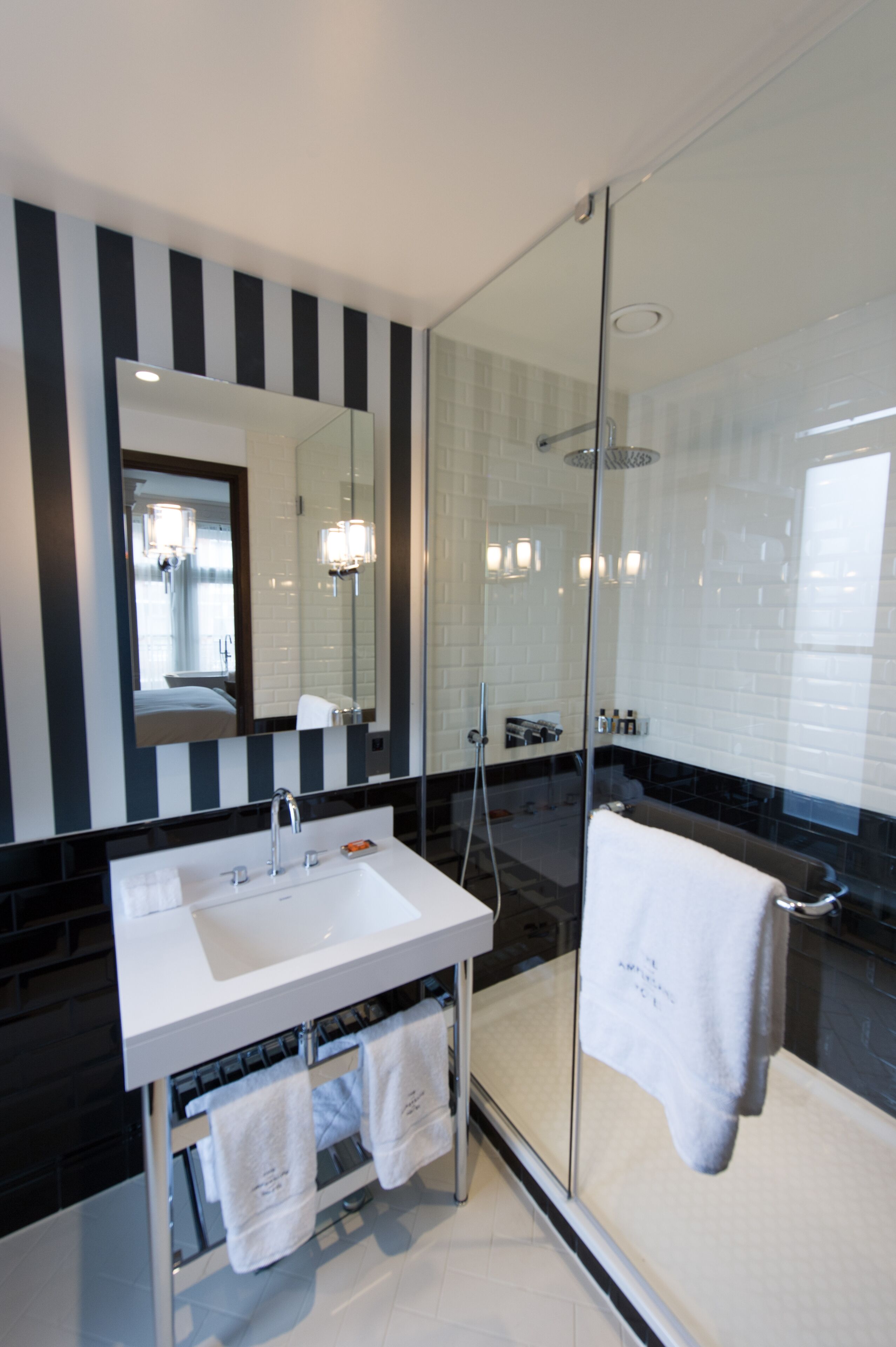 deluxe studio | bathroom | designer toiletries, hair dryer, towels