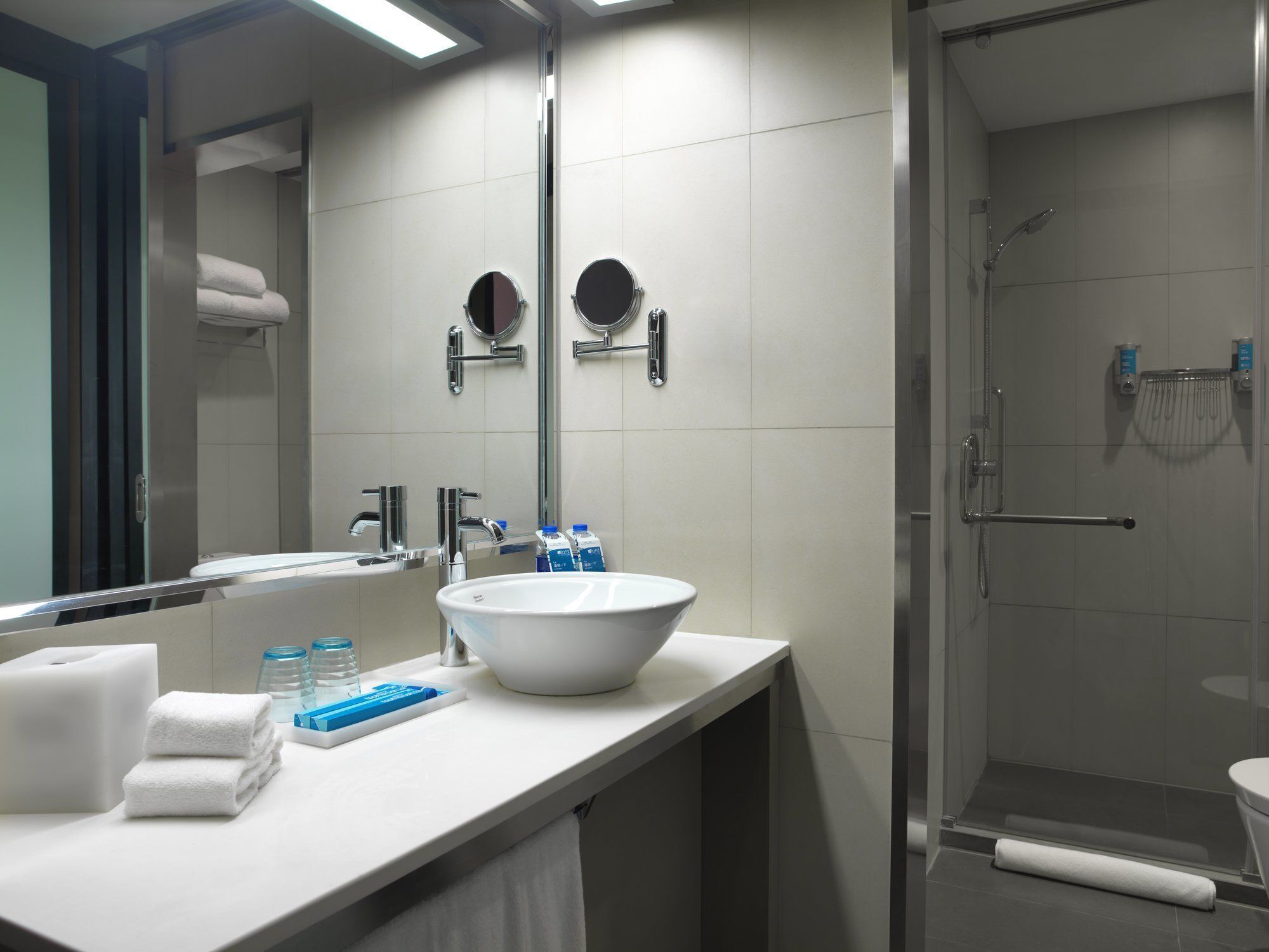 Shower, rainfall showerhead, designer toiletries, hair dryer