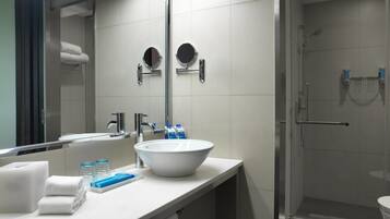 Shower, rainfall showerhead, designer toiletries, hair dryer