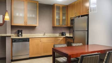 Suite, 1 Bedroom | Private kitchen | Fridge, microwave, stovetop, dishwasher