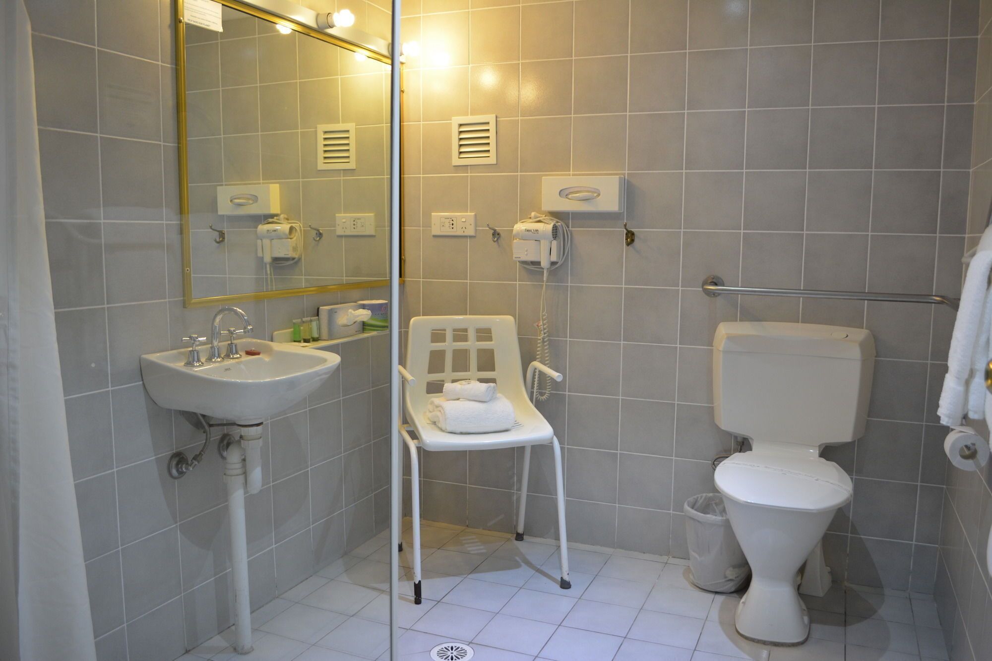 hair dryer, towels, soap, shampoo