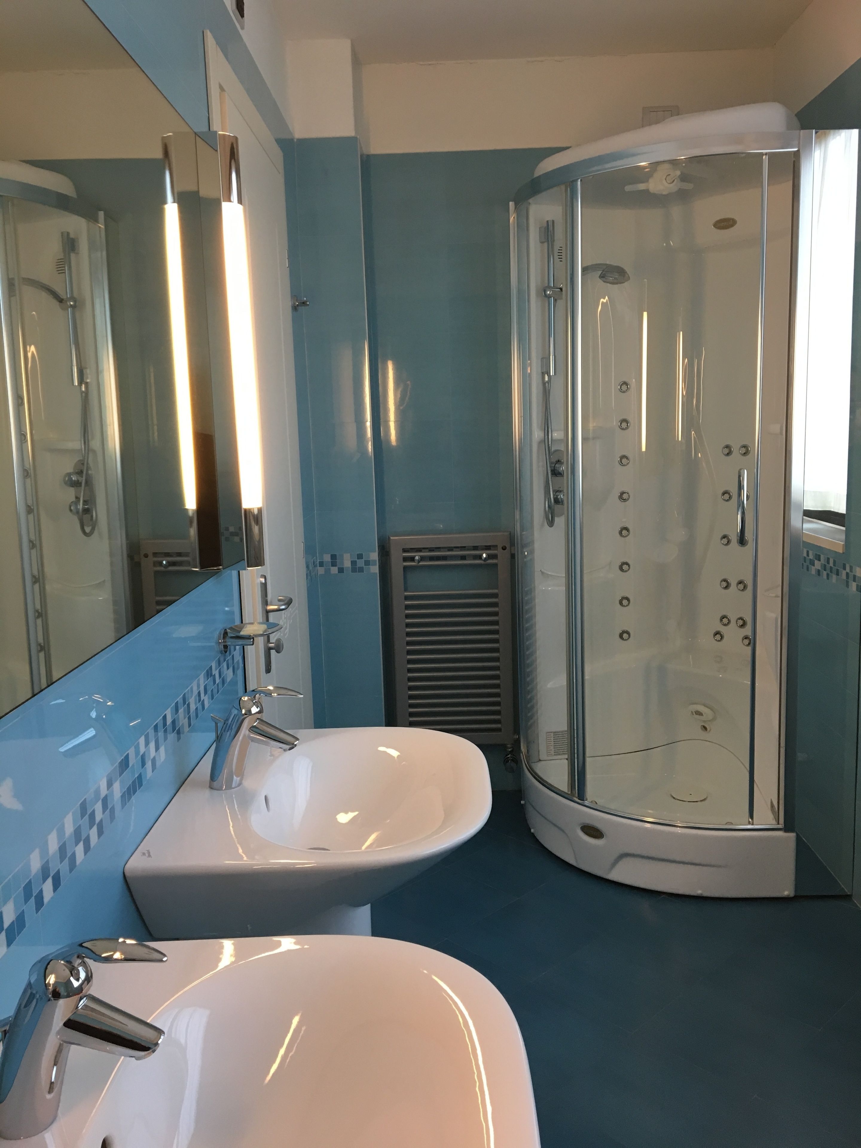 shower, rainfall showerhead, designer toiletries, hair dryer