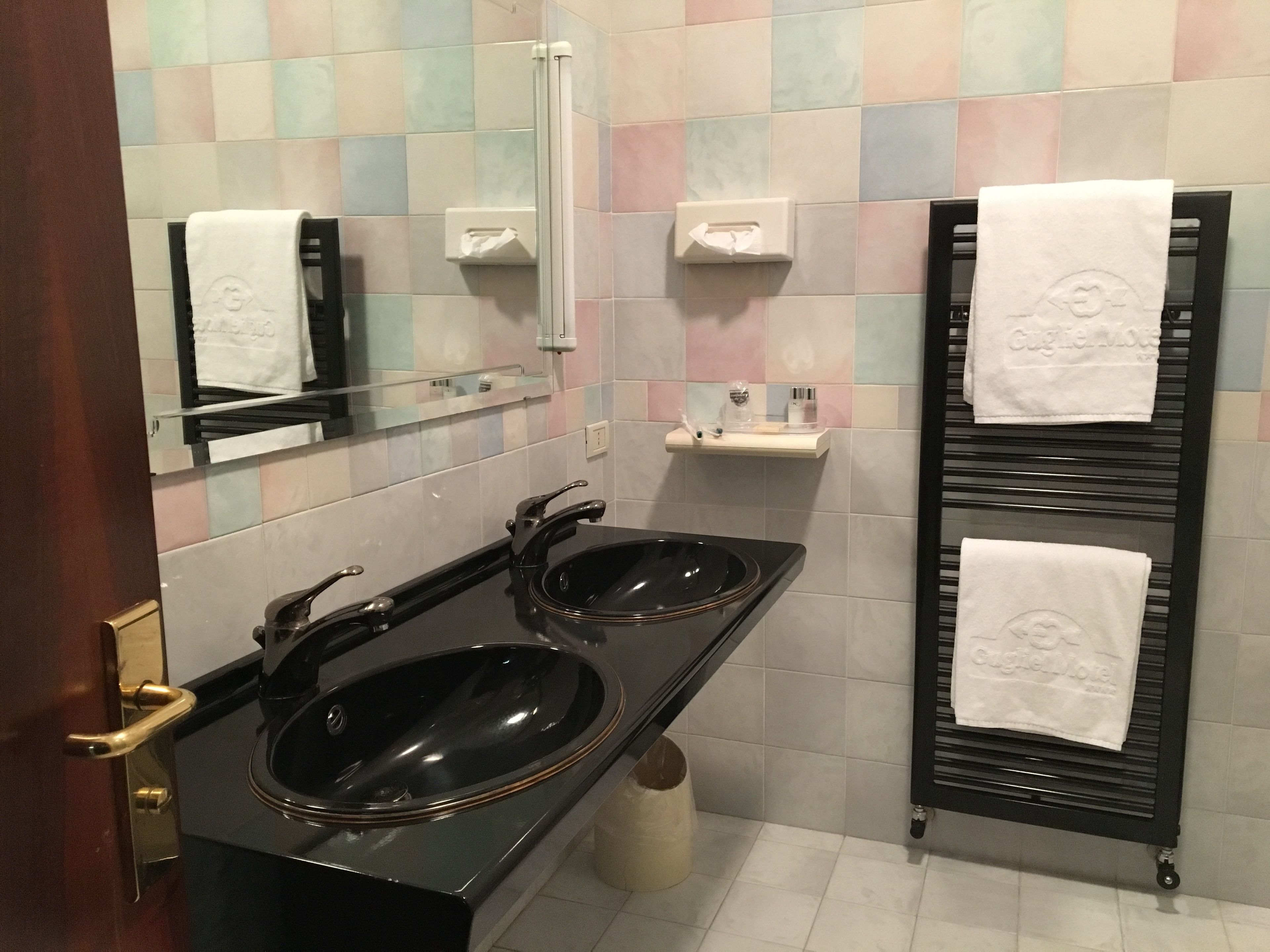 shower, rainfall showerhead, designer toiletries, hair dryer