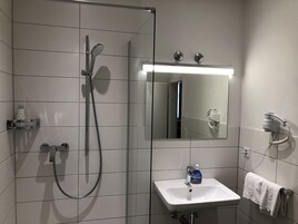 Shower, free toiletries, hair dryer, towels