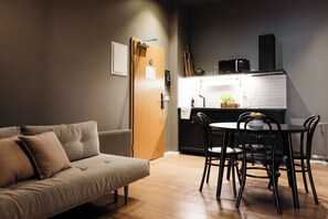 One Bedroom Apartment (3 adults) | Living area