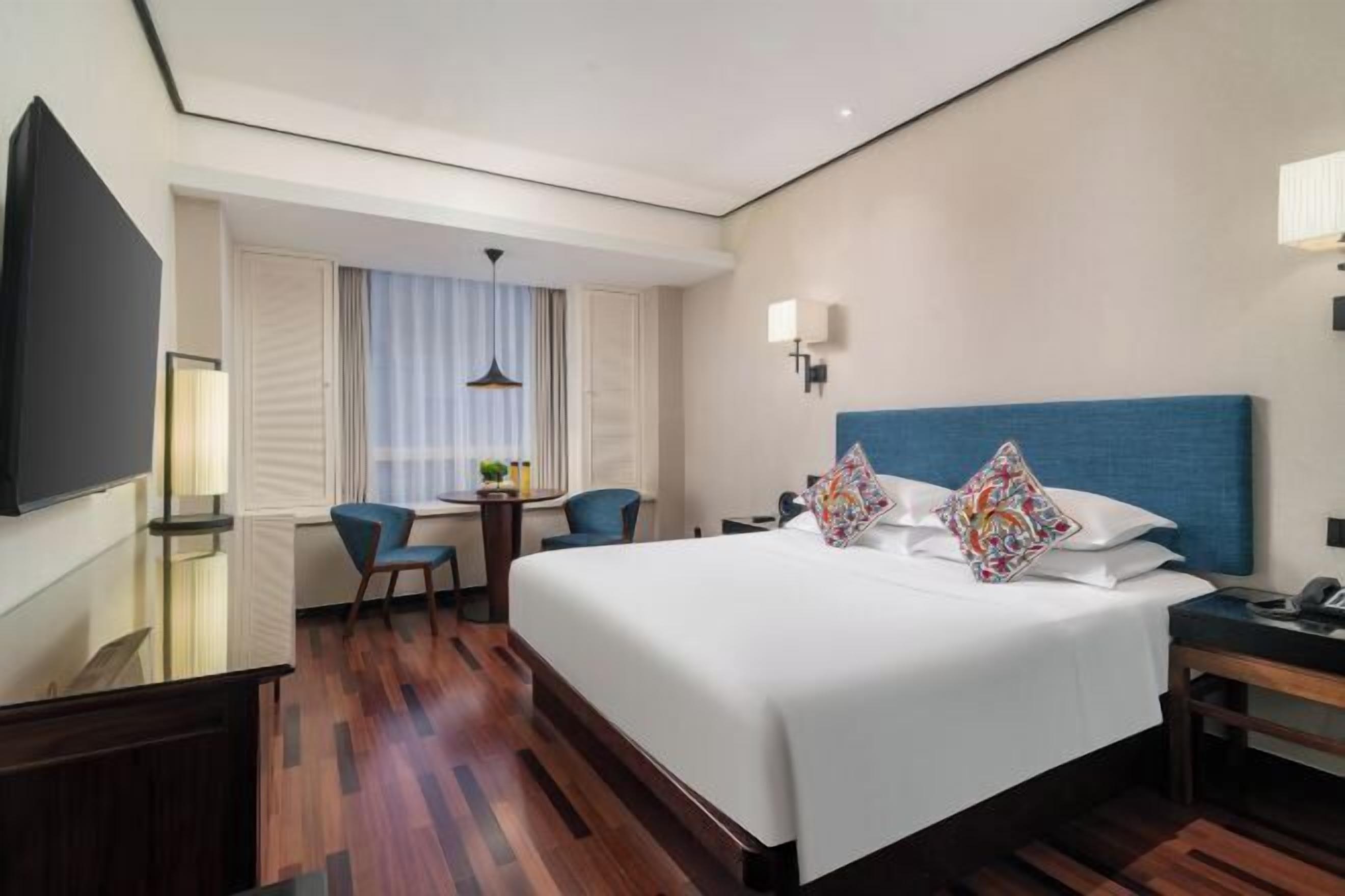 Premium bedding, down comforters, pillowtop beds, free minibar