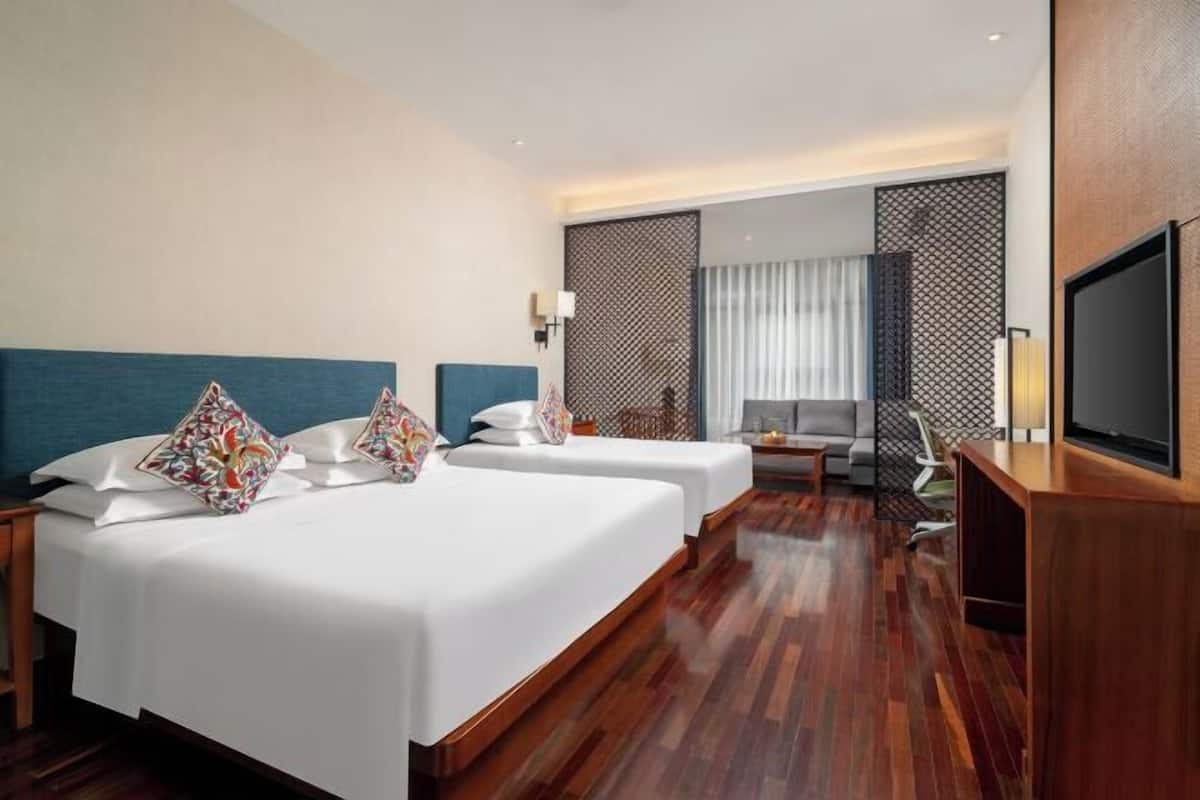 Luxe beddengoed, donsdekens, pillowtop-bedden, een gratis minibar