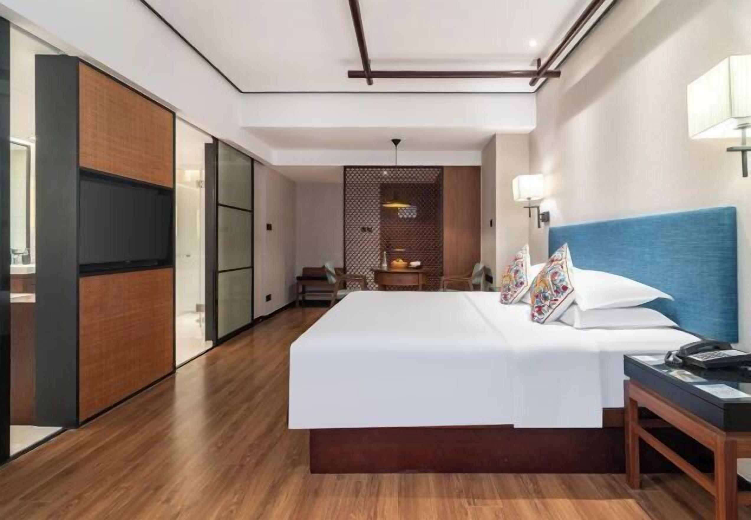 Premium bedding, down comforters, pillowtop beds, free minibar