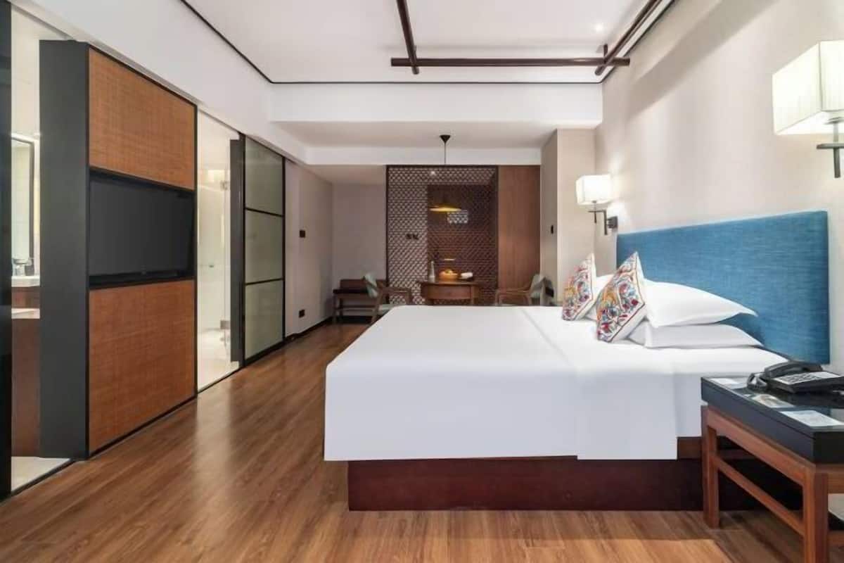 Premium bedding, down comforters, pillowtop beds, free minibar