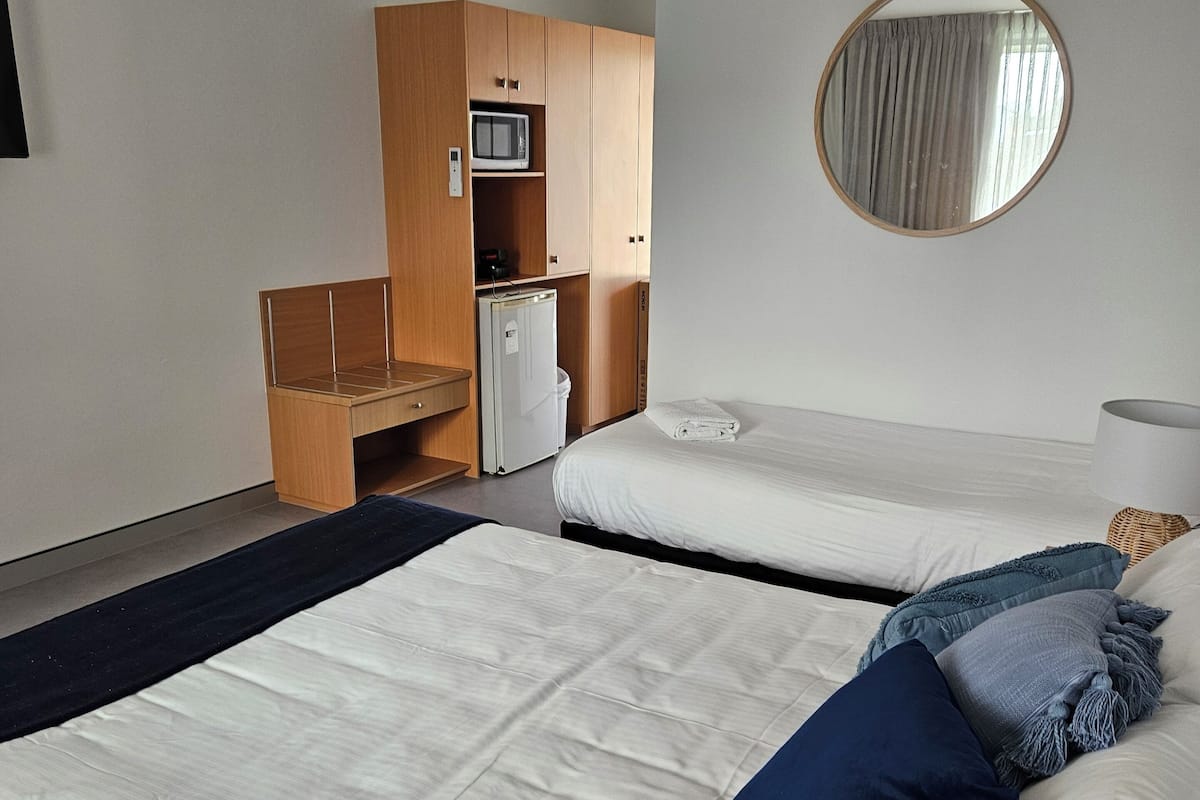 Family Room | 2 bedrooms, blackout curtains, soundproofing, iron/ironing board