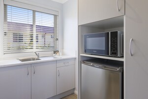 Elite Double Room | Private kitchen | Fridge, microwave, electric kettle, toaster