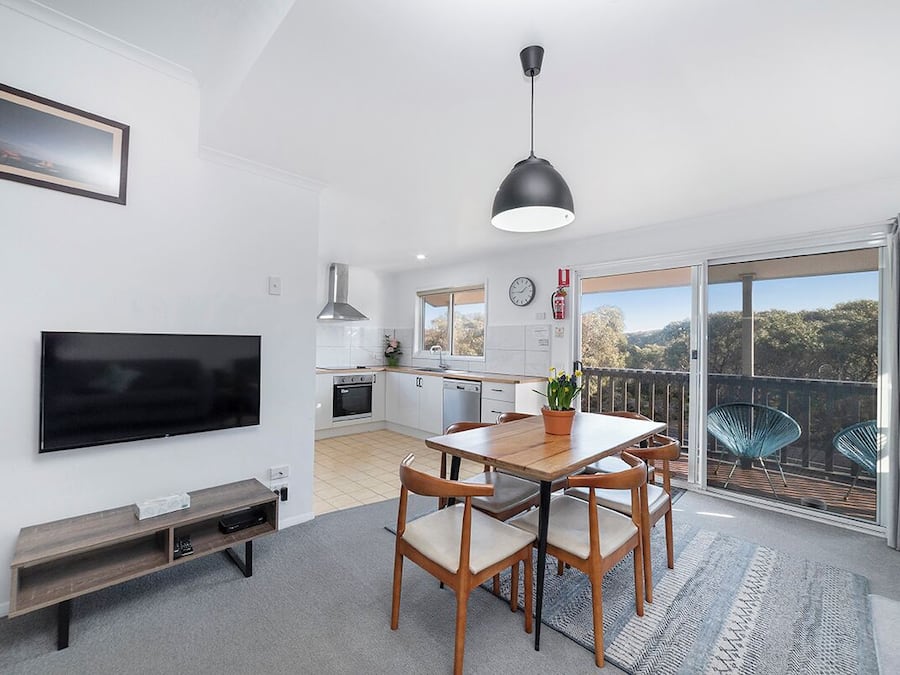 Upstairs 2 Bedroom Apartment | Living area | LCD TV