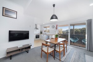 Upstairs 2 Bedroom Apartment | Living area | LCD TV