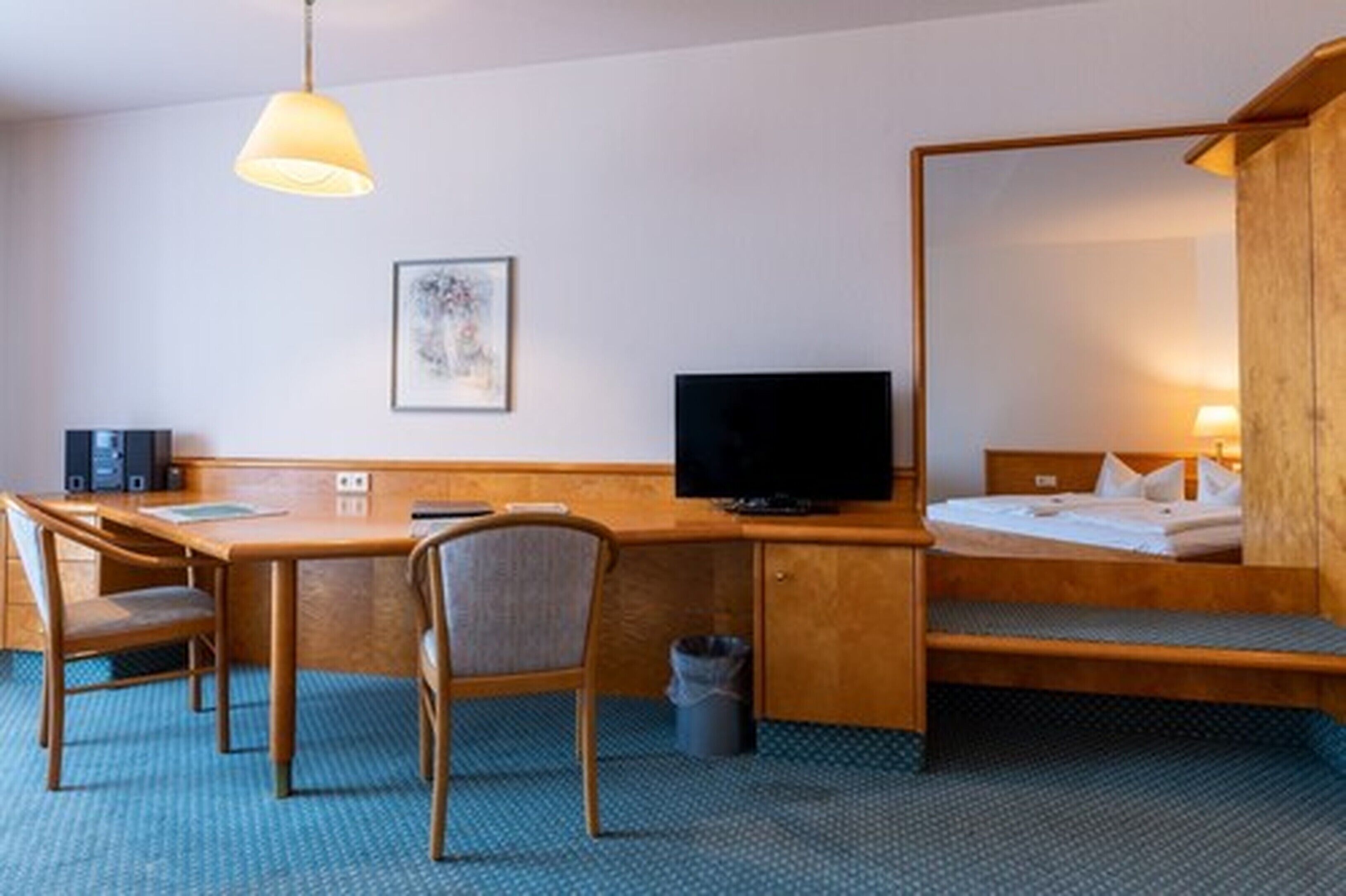 comfort double room | living area | 50-inch flat-screen tv with digital channels