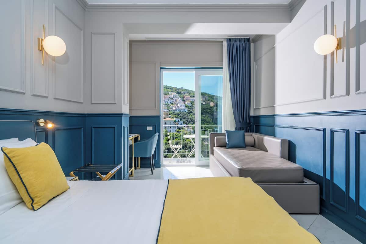 deluxe room, sea view, oceanfront | 1 bedroom, hypo-allergenic bedding, in-room safe, desk