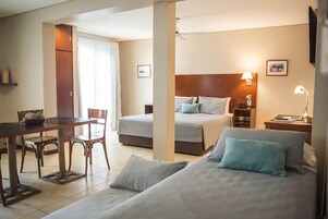 Triple Suite + Trundle Bed (4 people) | Premium bedding, down comforters, in-room safe, individually decorated