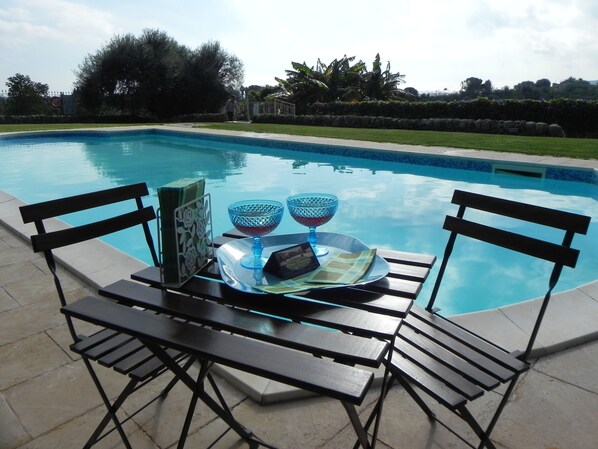 Outdoor pool, pool umbrellas, pool loungers