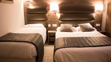 Down duvets, minibar, in-room safe, laptop workspace