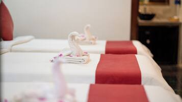 Deluxe Triple Room, Pool View | Minibar, in-room safe, individually decorated, individually furnished