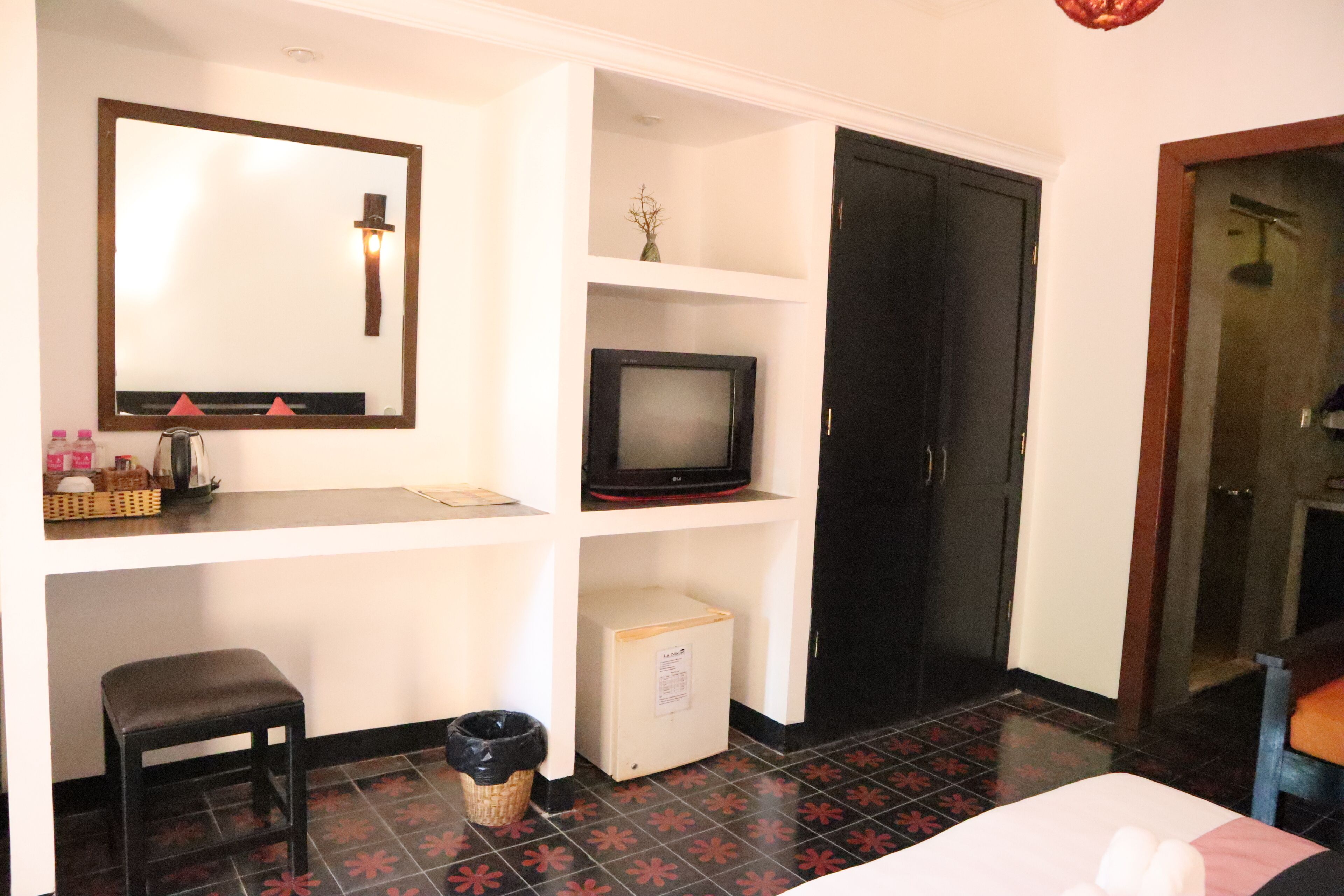 deluxe triple room, pool view | 1 bedroom, minibar, in-room safe, individually decorated