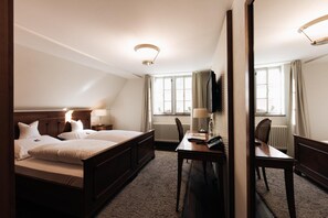 Ropa de cama de alta calidad y camas con pillow-top 