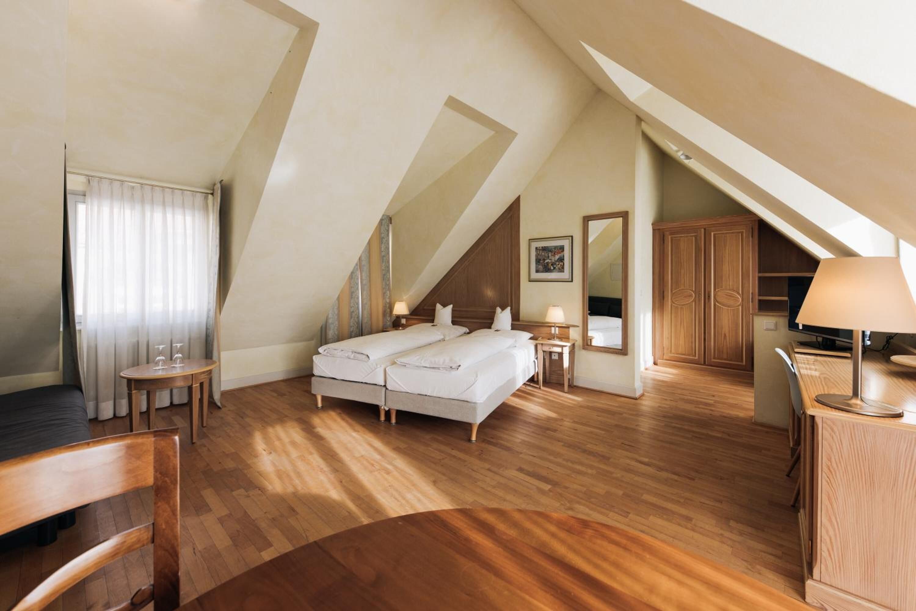 premium bedding, pillow-top beds, in-room safe, individually decorated