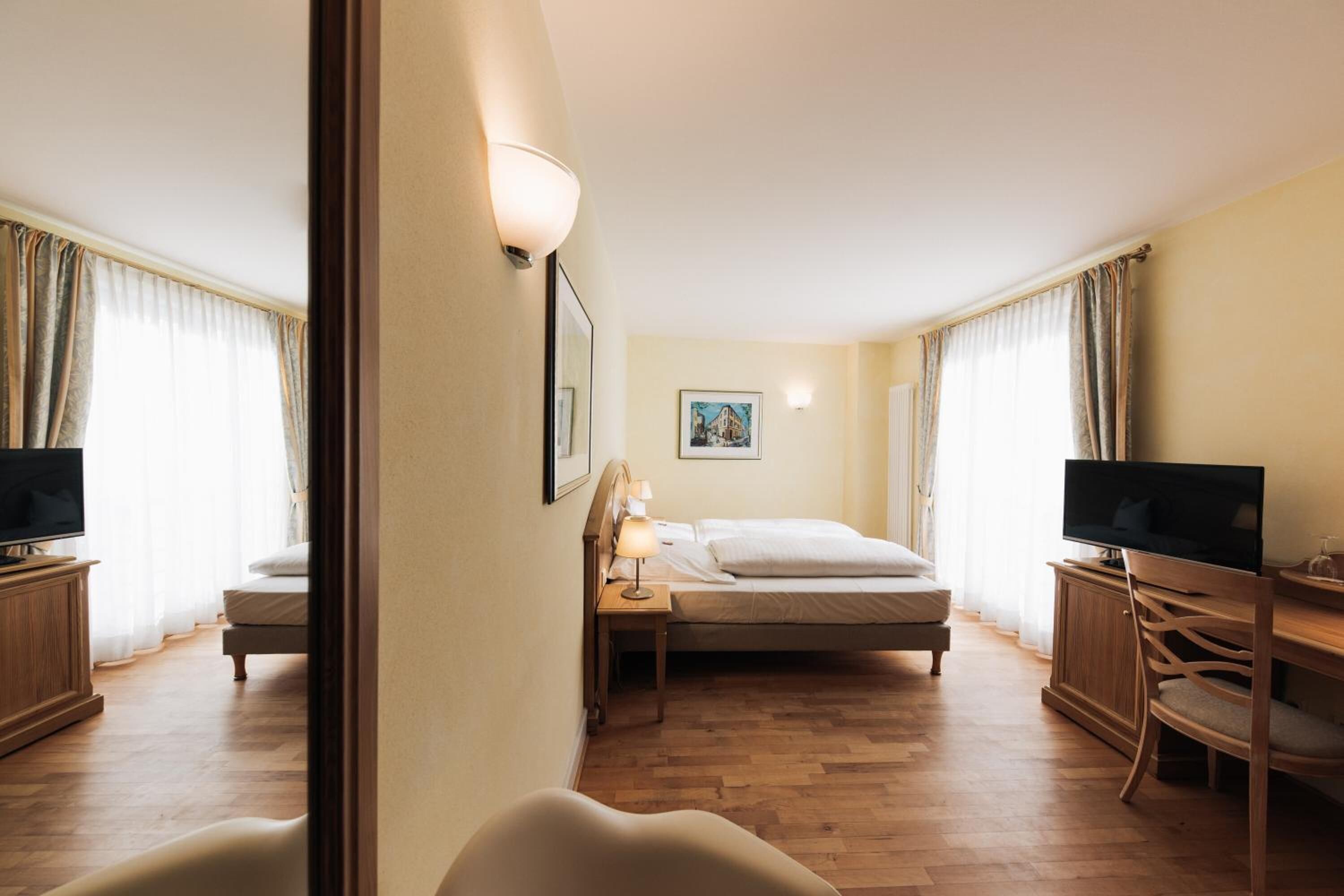 premium bedding, pillow-top beds, in-room safe, individually decorated