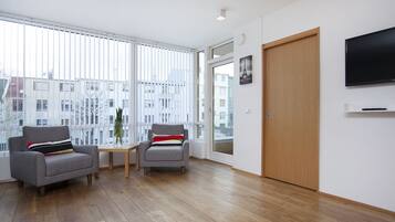 Apartment, 2 Bedrooms | Living area | LCD TV, DVD player, iPod dock