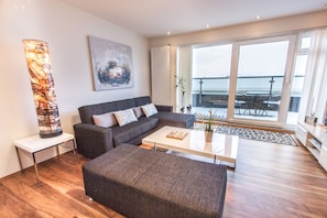 Apartment, 1 Bedroom | Living area | LCD TV, DVD player, iPod dock - Draumholl Apartments (Reykjavik)