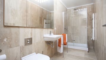 Apartment, 2 Bedrooms | Bathroom | Shower, hydromassage showerhead, hair dryer, bathrobes