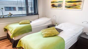 Apartment, 1 Bedroom | Down duvets, pillow-top beds, individually decorated