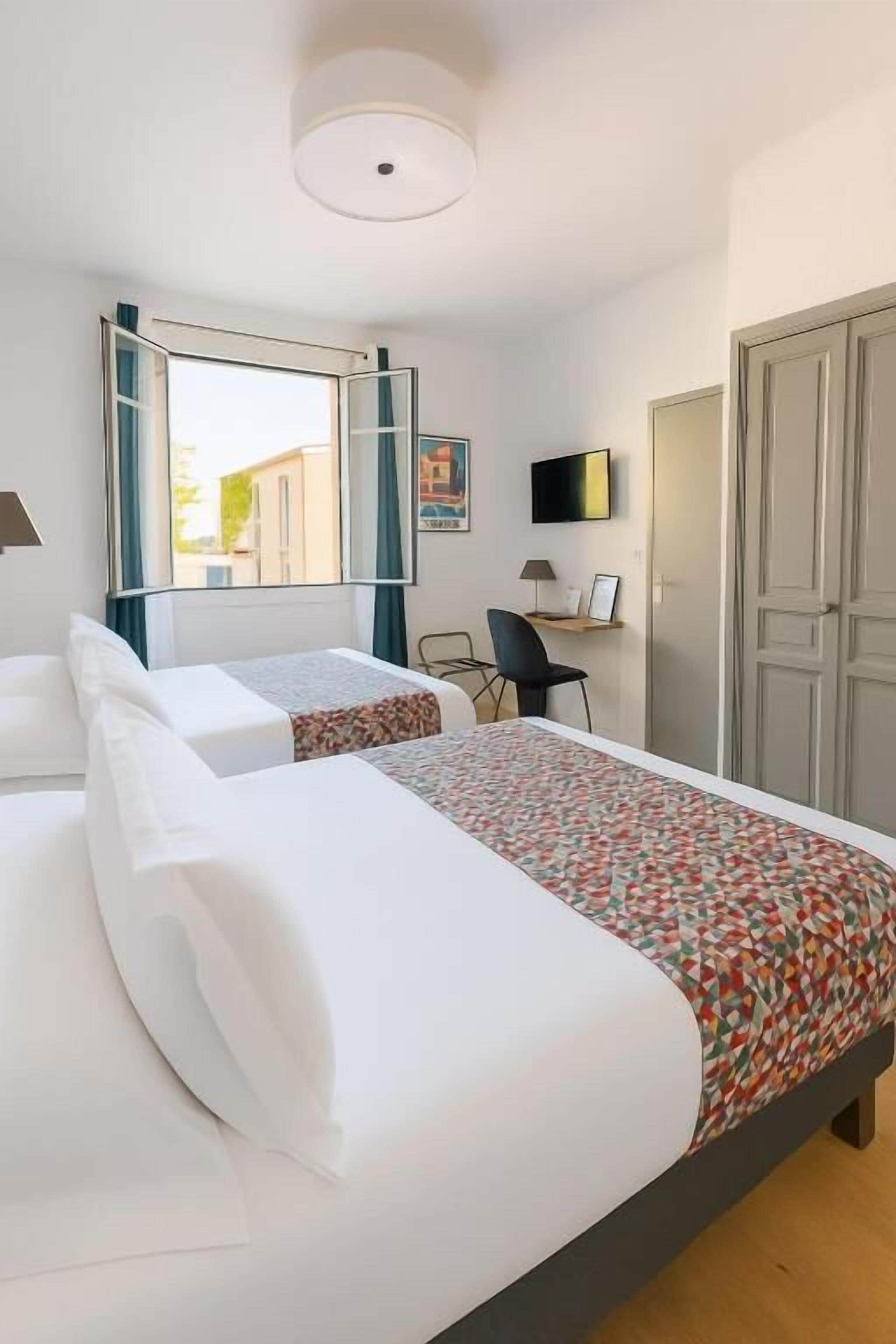 舒適四人房 | 舒適加層、熨斗/熨衣板、免費無線上網、床單