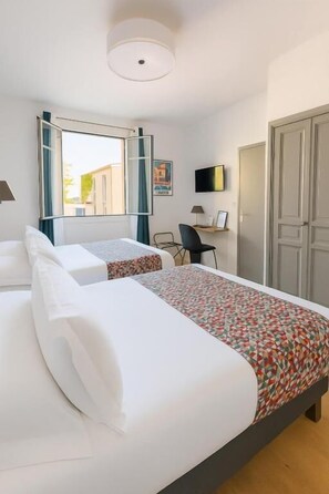 Colchones con pillow-top, tabla de planchar con plancha y wifi gratis 