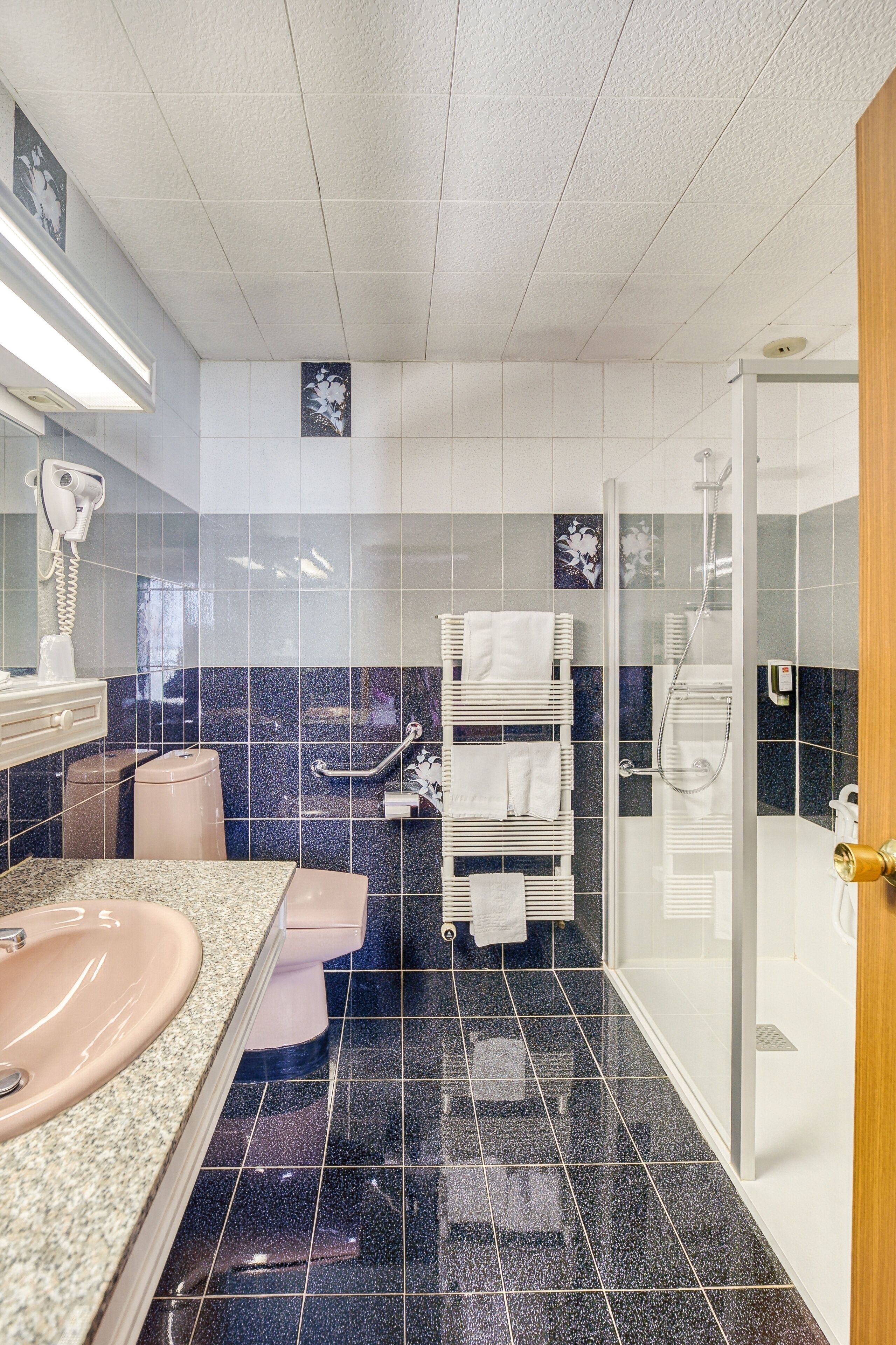 quadruple room | bathroom | shower, deep-soaking bathtub, rainfall showerhead, hair dryer