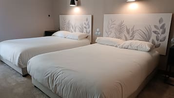 Quadruple Room | Premium bedding, individually furnished, desk, blackout curtains