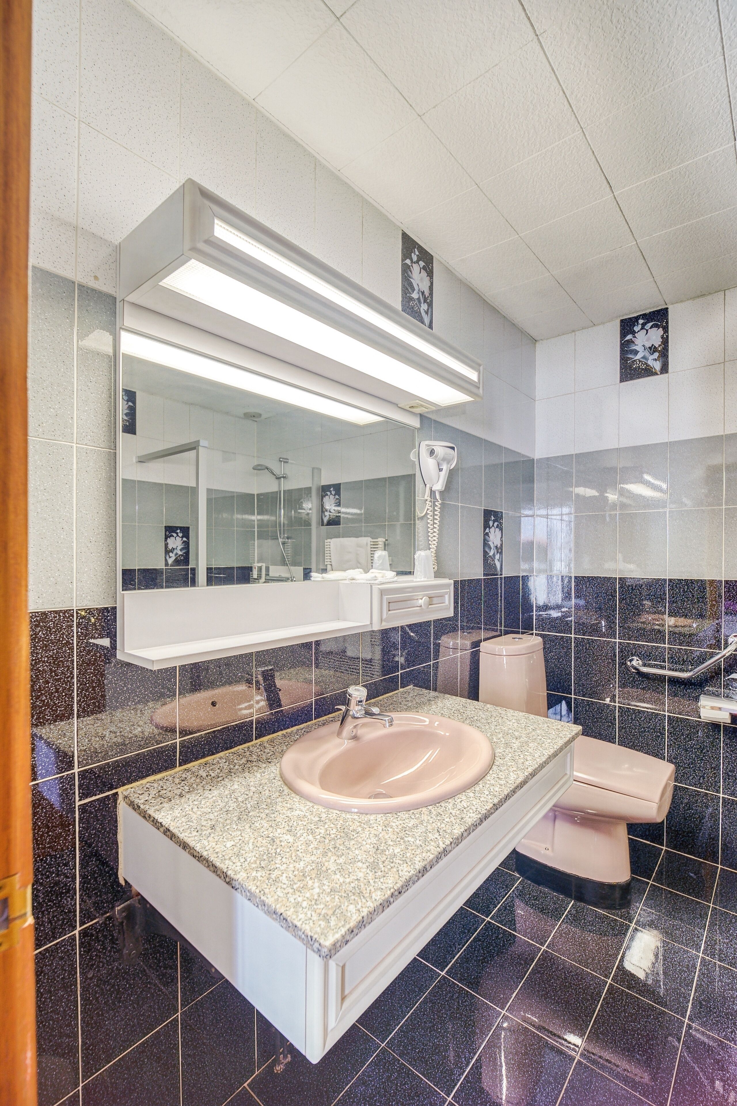 quadruple room | bathroom | shower, deep-soaking bathtub, rainfall showerhead, hair dryer