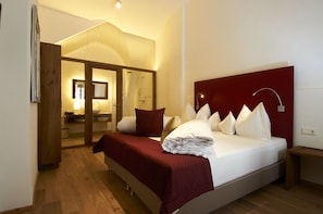 Luxe beddengoed, pillowtop-bedden, een gratis minibar