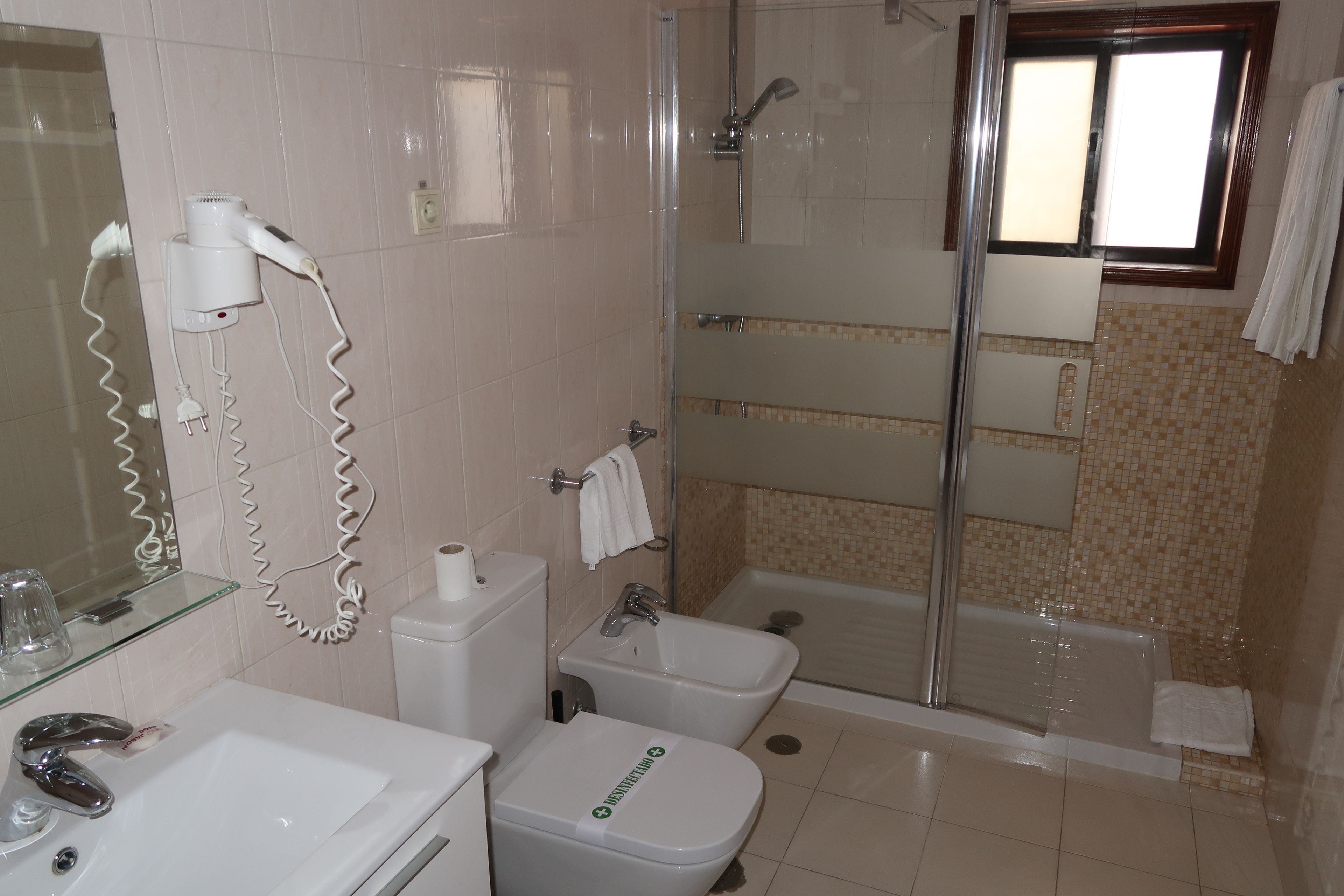 family double room | bathroom | hair dryer, bathrobes, bidet, towels