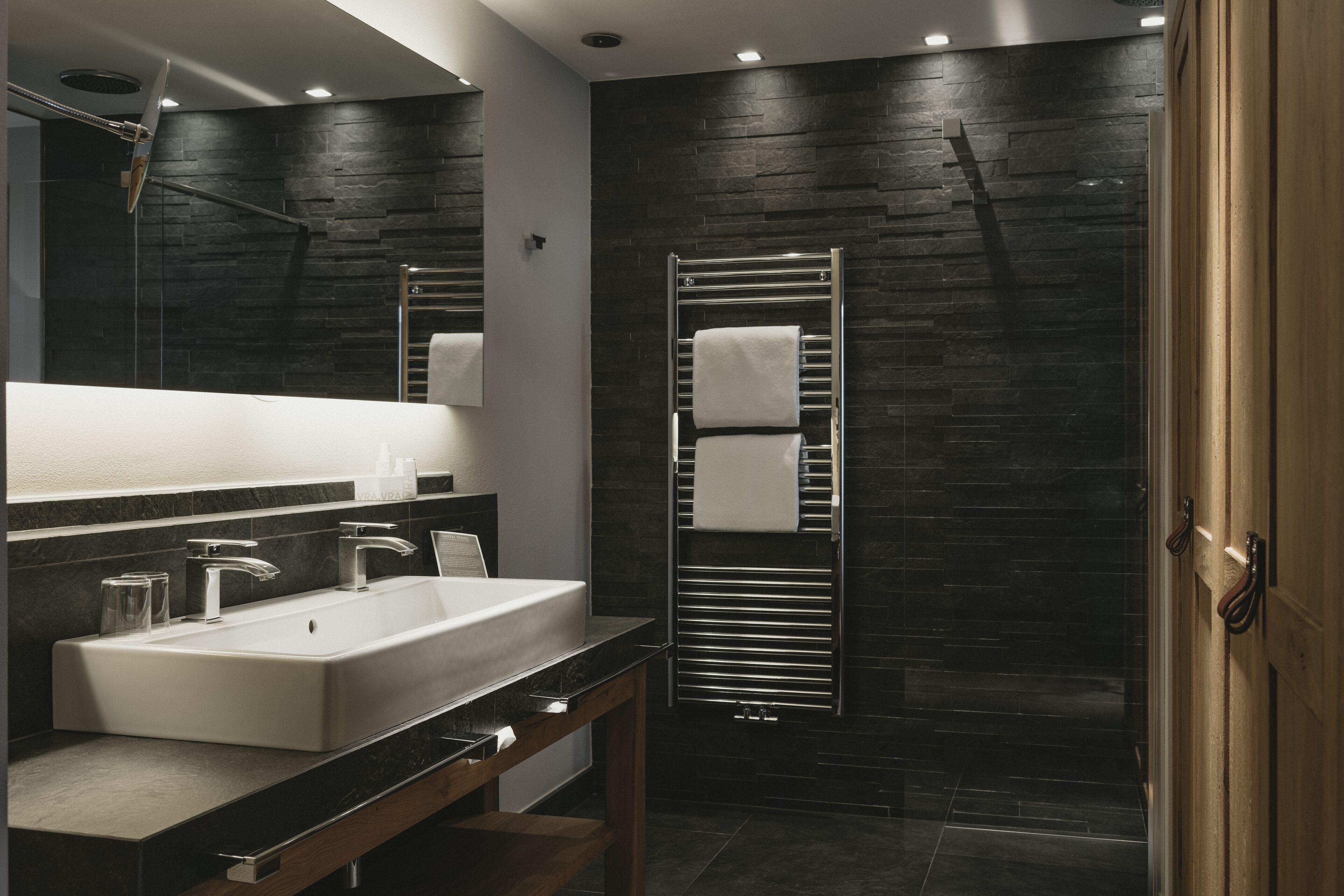 deluxe suite | bathroom | shower, rainfall showerhead, free toiletries, hair dryer