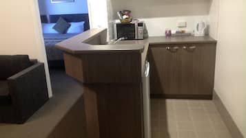 Fridge, microwave, coffee/tea maker, electric kettle