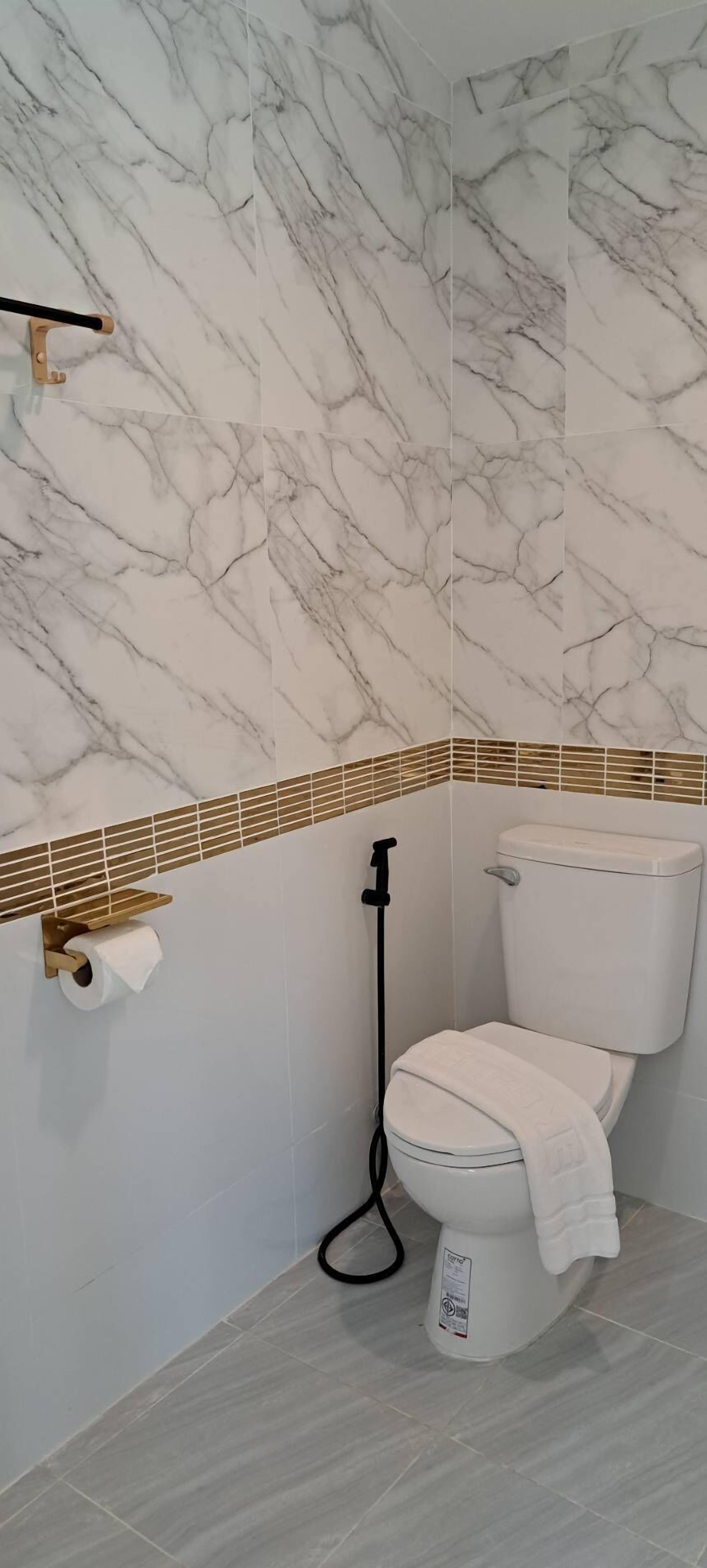 Deluxe Mable Room | Banheiro | Chuveiro, produtos de toalete grátis, toalhas de banho 