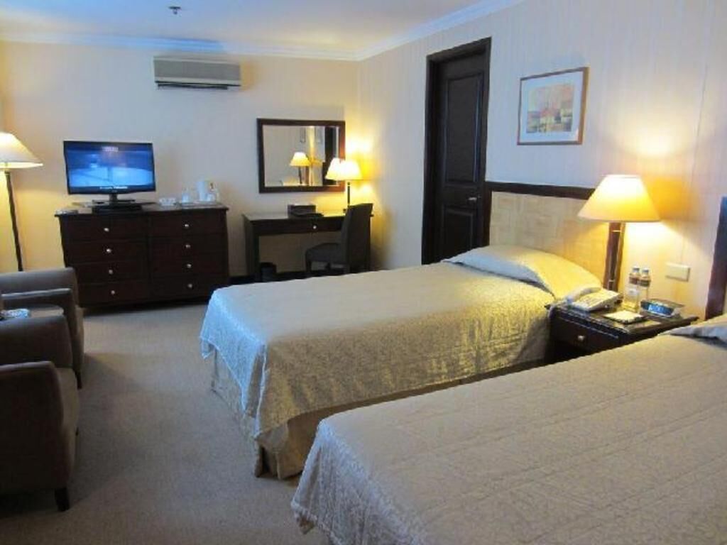 Minibar, värdeförvaringsskåp på rummet och individuell inredning