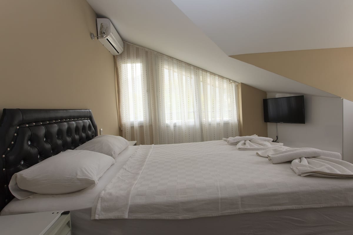 Loft Keluarga | Minibar, Wi-Fi gratis, dan seprai linen