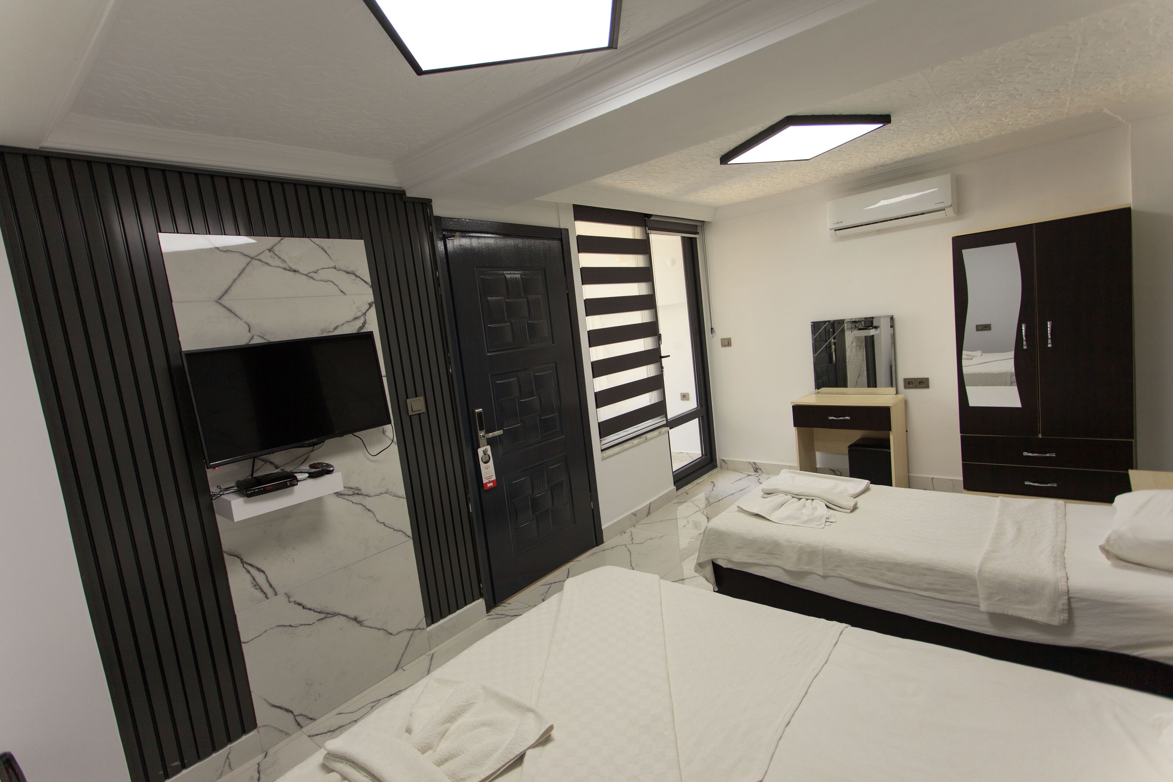 Family Triple Room | Minibar, free WiFi, bed sheets