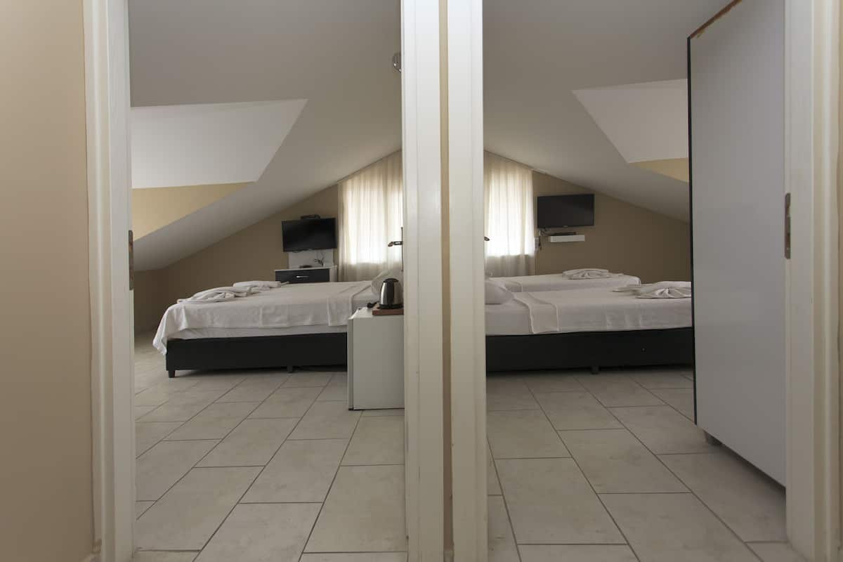 Familie loft ( Five Pax) | Een minibar, gratis wifi, beddengoed