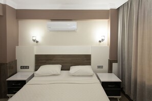 Minibar, accès au Wi-Fi (inclus), literie fournie