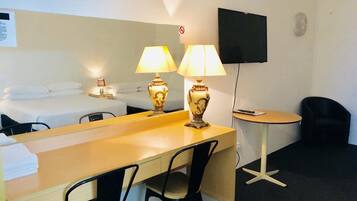 Desk, blackout curtains, soundproofing, cots/infant beds